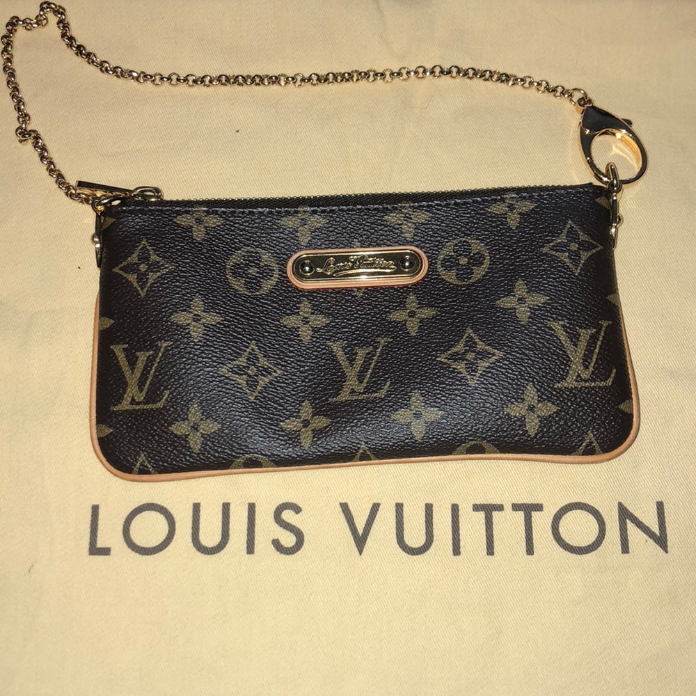 Small leather Louis Vuitton pouch on chain